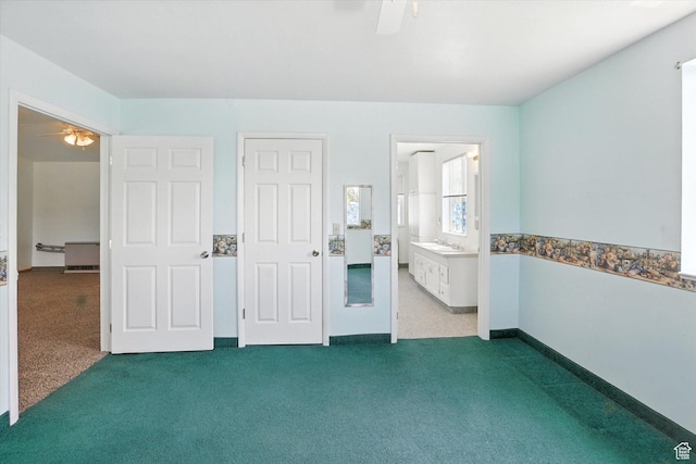 390 N 400 W, Malad City, ID 83252 - unfurnished bedroom featuring carpet flooring, a ceiling fan, and ensuite bathroom