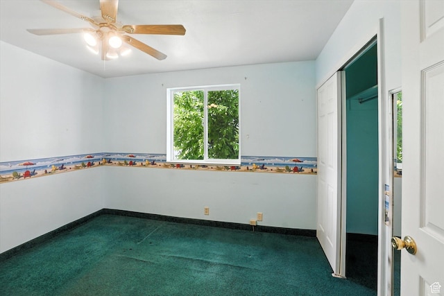 390 N 400 W, Malad City, ID 83252 - unfurnished bedroom featuring dark colored carpet, a ceiling fan, and a closet
