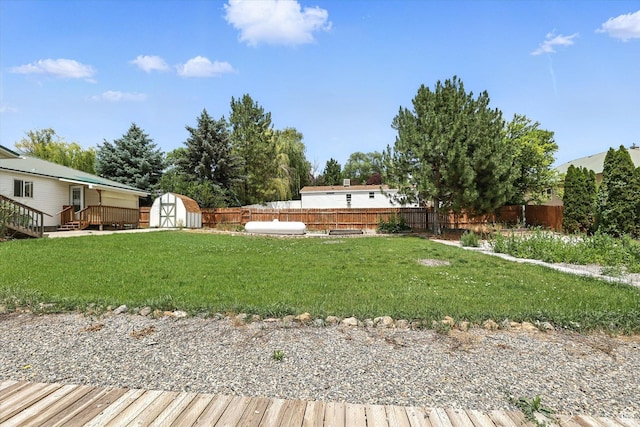 390 N 400 W, Malad City, ID 83252 - fenced backyard featuring a storage shed and a wooden deck