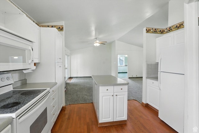 390 N 400 W, Malad City, ID 83252 - kitchen with white appliances, ceiling fan, dark wood finished floors, lofted ceiling, and open floor plan