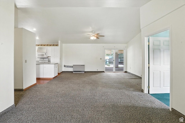 390 N 400 W, Malad City, ID 83252 - unfurnished living room with dark carpet and a ceiling fan