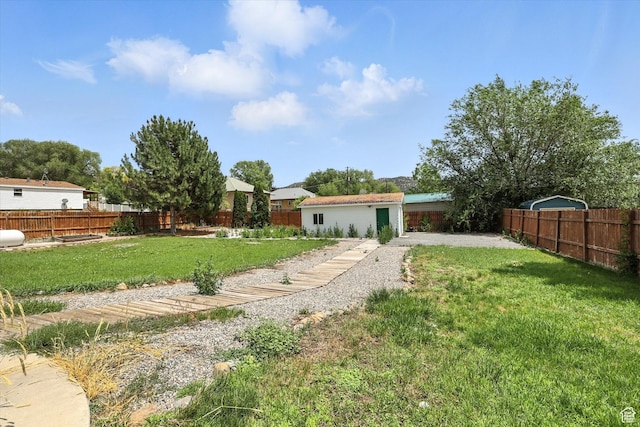 390 N 400 W, Malad City, ID 83252 - fenced backyard with a patio area
