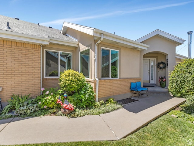 2287 N 470 E, Provo, UT 84604 - view of exterior entry featuring brick siding and stucco siding