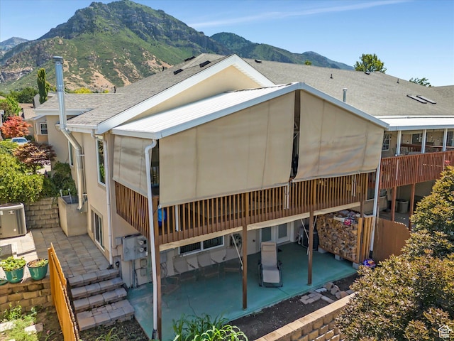 2287 N 470 E, Provo, UT 84604 - rear view of house with a patio, a mountain view, and roof with shingles