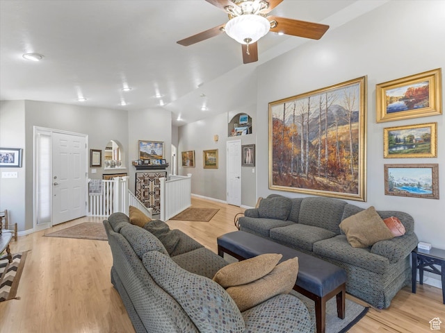 2287 N 470 E, Provo, UT 84604 - living room featuring a ceiling fan, light wood finished floors, and arched walkways