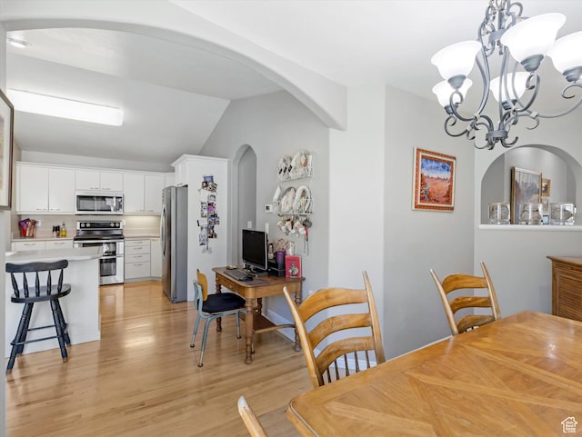 2287 N 470 E, Provo, UT 84604 - dining room with arched walkways, light wood-style flooring, vaulted ceiling, and a chandelier