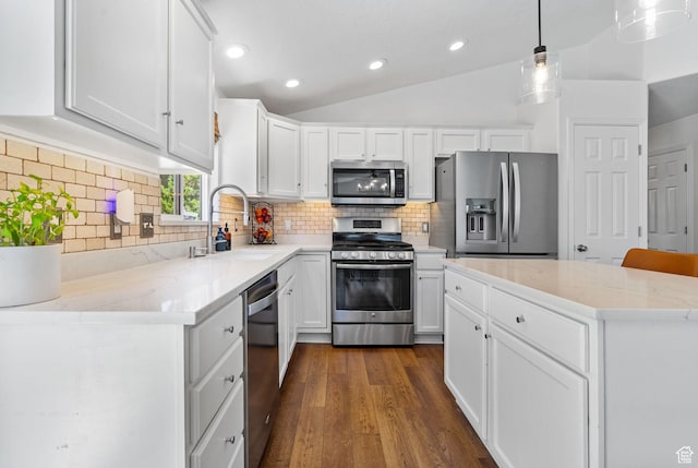 2344 E 1120 S, Spanish Fork, UT 84660 - kitchen featuring stainless steel appliances, dark wood-style flooring, vaulted ceiling, white cabinetry, and recessed lighting
