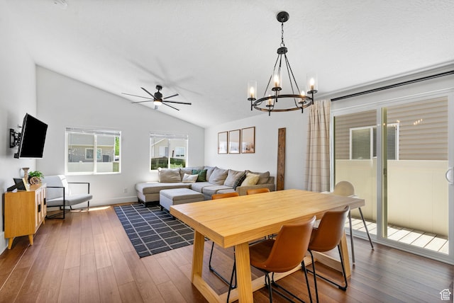 2344 E 1120 S, Spanish Fork, UT 84660 - dining space featuring a chandelier, vaulted ceiling, a ceiling fan, and dark wood-style flooring