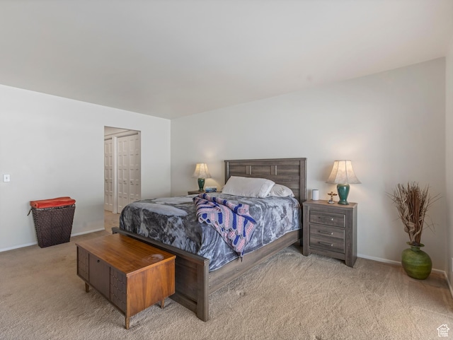 4856 S 1690 E # 88, Salt Lake City, UT 84117 - bedroom featuring light carpet and baseboards