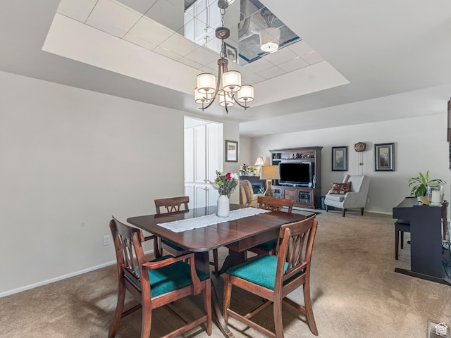 4856 S 1690 E # 88, Salt Lake City, UT 84117 - carpeted dining room with a chandelier and a tray ceiling