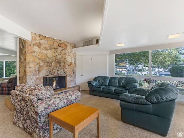 4856 S 1690 E # 88, Salt Lake City, UT 84117 - carpeted living area featuring healthy amount of natural light and a stone fireplace