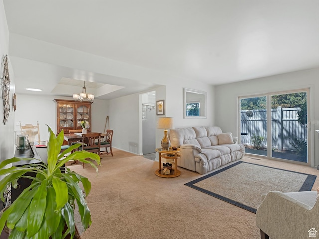 4856 S 1690 E # 88, Salt Lake City, UT 84117 - living area with a tray ceiling, carpet floors, and a chandelier