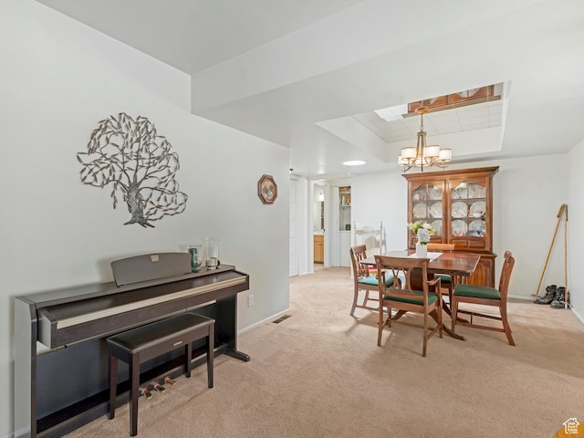 4856 S 1690 E # 88, Salt Lake City, UT 84117 - dining area featuring a chandelier, a tray ceiling, and light colored carpet