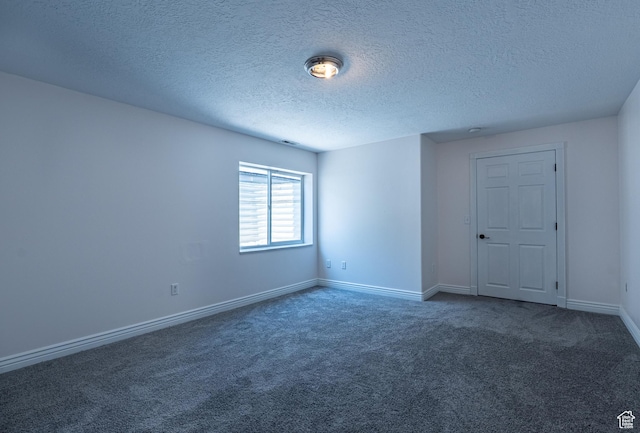 984 S 925 W, Woods Cross, UT 84087 - spare room with carpet and a textured ceiling
