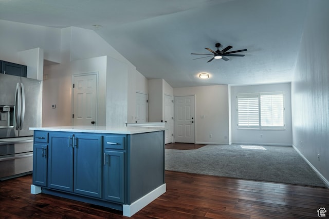 984 S 925 W, Woods Cross, UT 84087 - kitchen with stainless steel refrigerator with ice dispenser, blue cabinetry, a ceiling fan, open floor plan, and vaulted ceiling