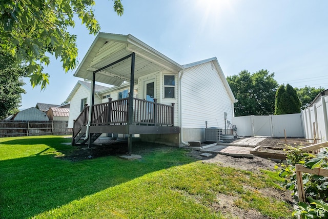 984 S 925 W, Woods Cross, UT 84087 - rear view of property featuring a fenced backyard and a wooden deck