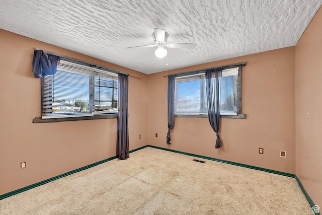 5577 W 4000 S, Hooper, UT 84315 - empty room with ceiling fan, a textured ceiling, and carpet floors