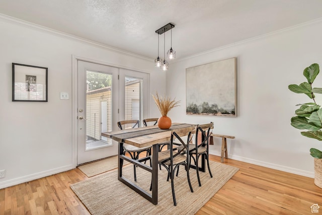 4269 S Vegas Way E, Holladay, UT 84124 - dining space featuring ornamental molding and light wood-style flooring