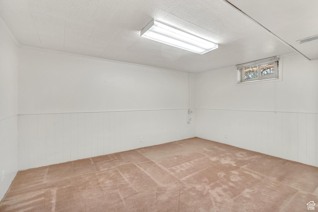 4269 S Vegas Way E, Holladay, UT 84124 - unfurnished room featuring carpet, wooden walls, and a wainscoted wall