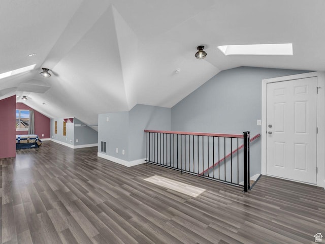 8503 S Spiral Jetty Cir W Unit 2083, West Jordan, UT 84081 - bonus room featuring a skylight, lofted ceiling, and wood finished floors