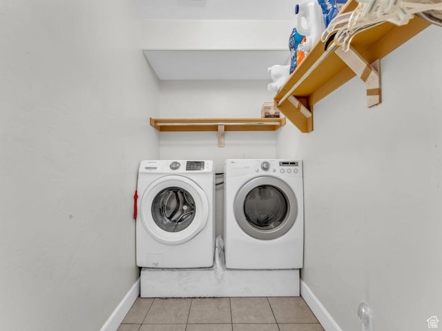 8503 S Spiral Jetty Cir W Unit 2083, West Jordan, UT 84081 - laundry room featuring washer and clothes dryer and light tile patterned floors