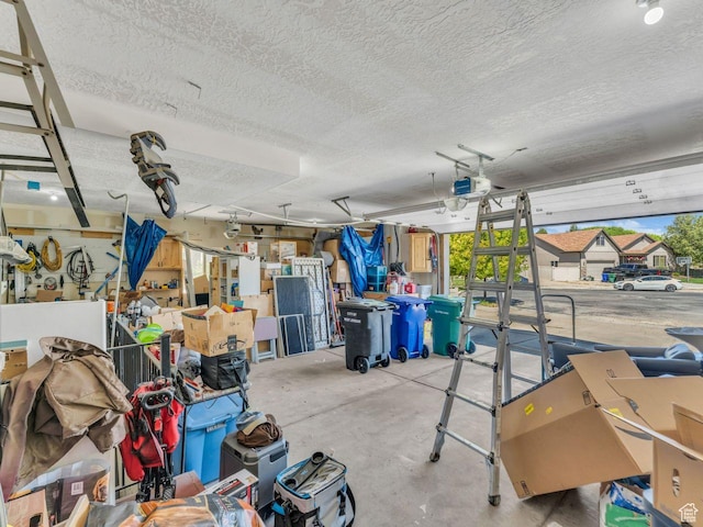 8503 S Spiral Jetty Cir W Unit 2083, West Jordan, UT 84081 - garage featuring a garage door opener