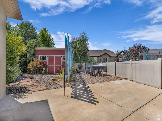 8503 S Spiral Jetty Cir W Unit 2083, West Jordan, UT 84081 - fenced backyard with a patio area and a shed