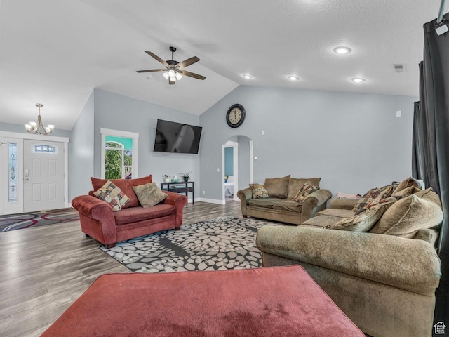 8503 S Spiral Jetty Cir W Unit 2083, West Jordan, UT 84081 - living room with arched walkways, wood finished floors, a chandelier, lofted ceiling, and ceiling fan