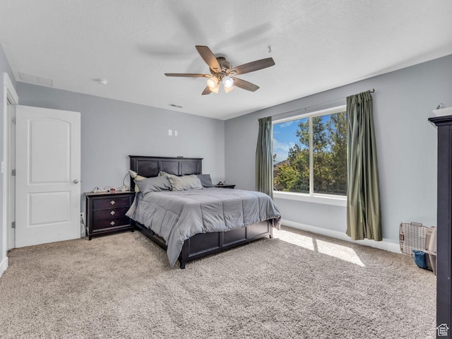 8503 S Spiral Jetty Cir W Unit 2083, West Jordan, UT 84081 - carpeted bedroom featuring a ceiling fan