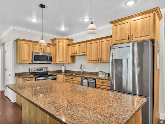 8503 S Spiral Jetty Cir W Unit 2083, West Jordan, UT 84081 - kitchen featuring appliances with stainless steel finishes, crown molding, a kitchen island, a textured ceiling, and dark wood-style floors