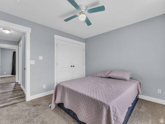 8503 S Spiral Jetty Cir W Unit 2083, West Jordan, UT 84081 - carpeted bedroom featuring a closet and a ceiling fan