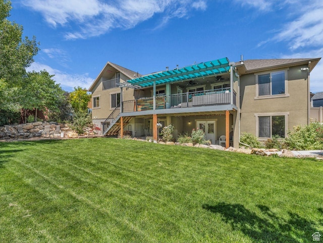 8503 S Spiral Jetty Cir W Unit 2083, West Jordan, UT 84081 - rear view of property featuring a ceiling fan, a deck, stucco siding, and stairway