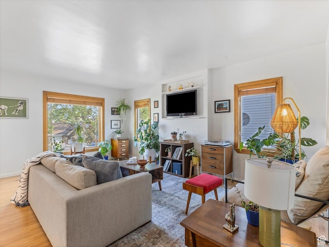 467 E 7th Ave N, Salt Lake City, UT 84103 - living area with light wood-style floors and baseboards