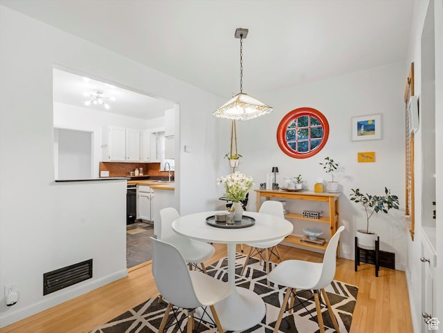467 E 7th Ave N, Salt Lake City, UT 84103 - dining space with light wood-style floors