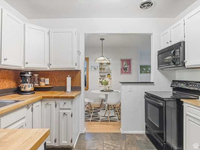 467 E 7th Ave N, Salt Lake City, UT 84103 - kitchen with black appliances, wooden counters, white cabinets, backsplash, and stone tile flooring