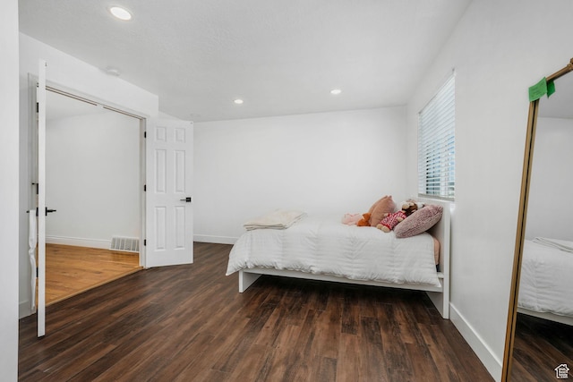 3142 S Sugar Bowl Ln, West Valley City, UT 84128 - bedroom with wood finished floors and recessed lighting