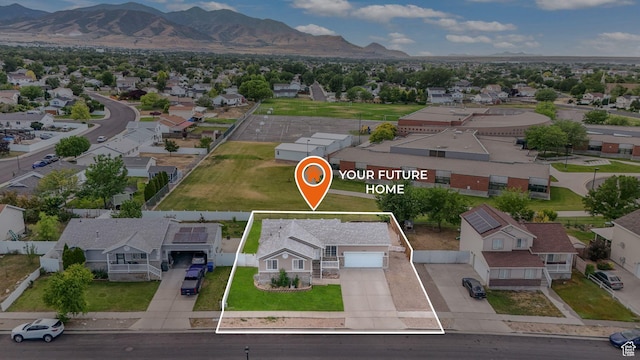 3142 S Sugar Bowl Ln, West Valley City, UT 84128 - aerial view of residential area featuring property parcel outlined and mountains