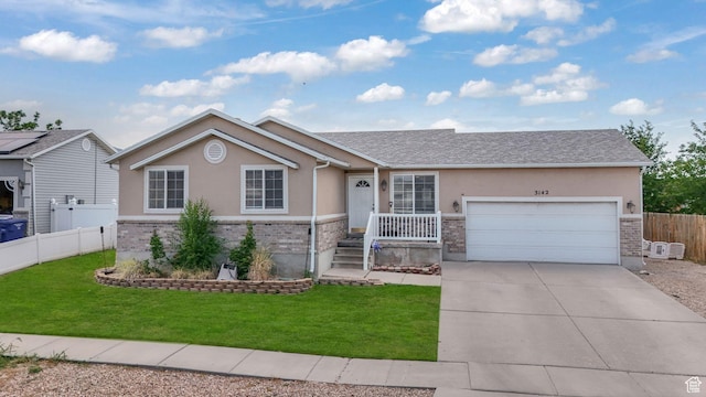 3142 S Sugar Bowl Ln, West Valley City, UT 84128 - ranch-style house with stucco siding, brick siding, driveway, and a garage