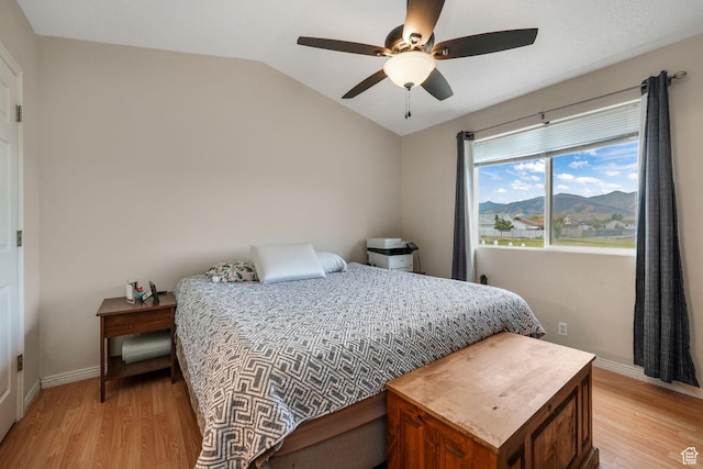 3142 S Sugar Bowl Ln, West Valley City, UT 84128 - bedroom featuring light wood-type flooring, vaulted ceiling, and ceiling fan