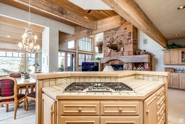 8200 Royal St Unit 43, Park City, UT 84060 - kitchen with tile counters, stainless steel gas cooktop, light colored carpet, beam ceiling, and recessed lighting