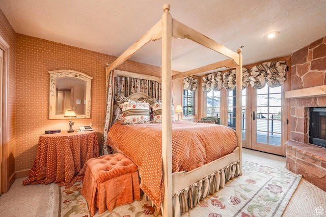 8200 Royal St Unit 43, Park City, UT 84060 - carpeted bedroom featuring access to outside and a fireplace