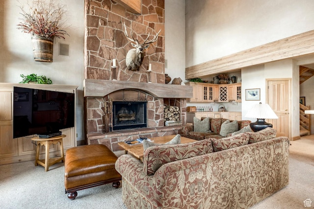 8200 Royal St Unit 43, Park City, UT 84060 - living room with carpet, a high ceiling, and a fireplace