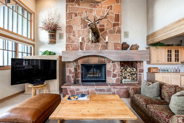 8200 Royal St Unit 43, Park City, UT 84060 - living area featuring a high ceiling and a fireplace