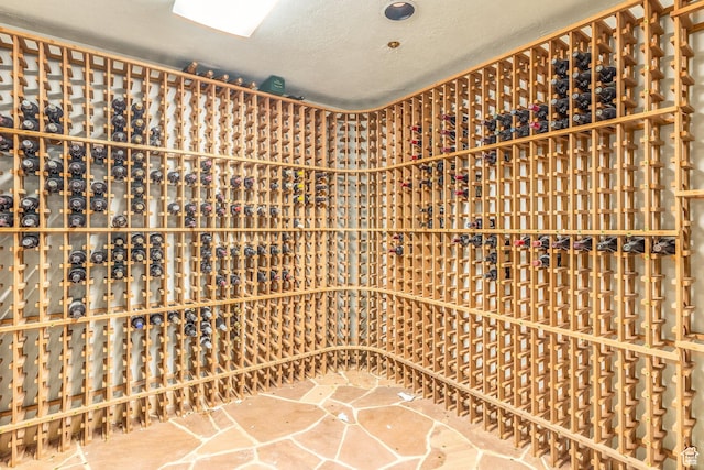 8200 Royal St Unit 43, Park City, UT 84060 - wine room with a textured ceiling and stone finish flooring