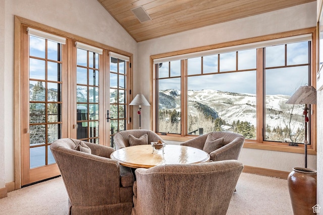 8200 Royal St Unit 43, Park City, UT 84060 - sitting room with vaulted ceiling, wooden ceiling, healthy amount of natural light, a mountain view, and carpet flooring