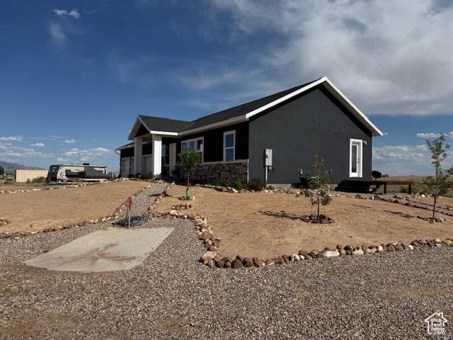 4058 E 5000 S, Vernal, UT 84078 - view of front of home featuring stone siding
