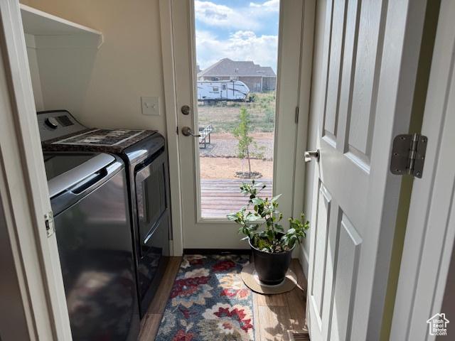 4058 E 5000 S, Vernal, UT 84078 - laundry room with washing machine and dryer and wood finished floors