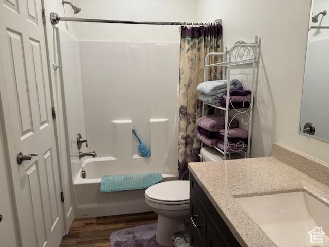 4058 E 5000 S, Vernal, UT 84078 - full bath with wood finished floors, shower / bath combo, and vanity