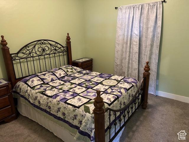 4058 E 5000 S, Vernal, UT 84078 - bedroom featuring carpet floors and baseboards