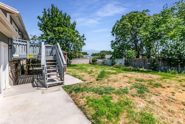 4287 W Stratus S, Kearns, UT 84118 - fenced backyard with a deck and stairs